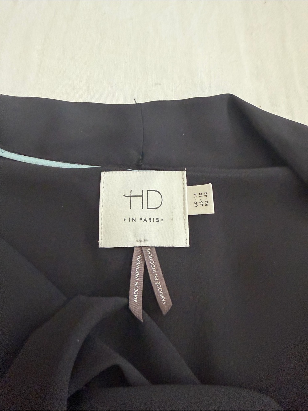 HD in Paris Black Top with Subtle Tag Detail